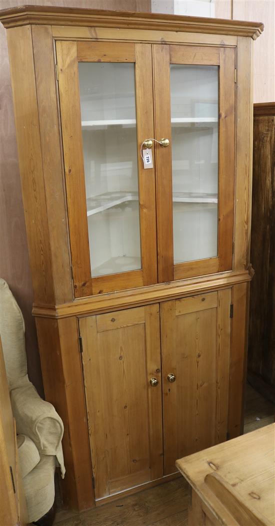 A pine corner cupboard, H.205cm